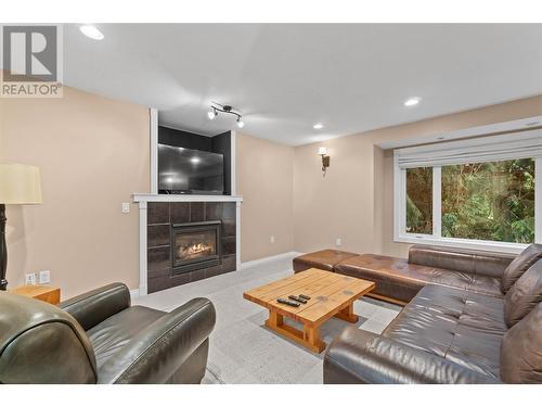 2565 Forest Drive, Blind Bay, BC - Indoor Photo Showing Living Room With Fireplace