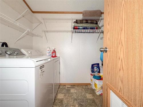 14 Robin Bay, Brandon, MB - Indoor Photo Showing Laundry Room