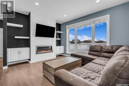 46 Country Crescent, Dundurn Rm No. 314, SK - Indoor Photo Showing Living Room With Fireplace