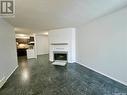 42 Cedar Meadow Drive, Regina, SK  - Indoor Photo Showing Living Room With Fireplace 