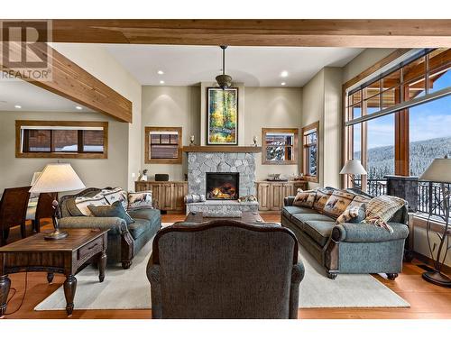 5040 Valley Drive Unit# 6, Sun Peaks, BC - Indoor Photo Showing Living Room With Fireplace