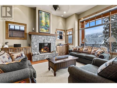 5040 Valley Drive Unit# 6, Sun Peaks, BC - Indoor Photo Showing Living Room With Fireplace