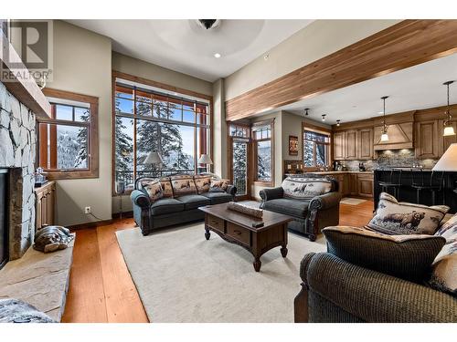 5040 Valley Drive Unit# 6, Sun Peaks, BC - Indoor Photo Showing Living Room With Fireplace