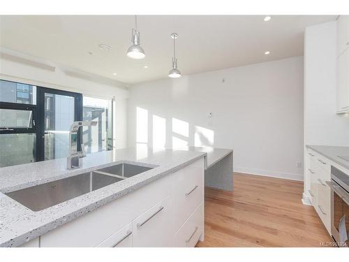 N309-1105 Pandora Ave, Victoria, BC - Indoor Photo Showing Kitchen With Double Sink With Upgraded Kitchen