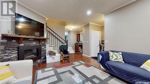 1137 Wallace Street, Regina, SK - Indoor Photo Showing Living Room With Fireplace