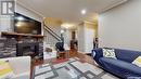 1137 Wallace Street, Regina, SK  - Indoor Photo Showing Living Room With Fireplace 