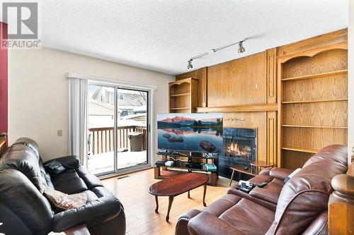 6556 Martingrove Drive Ne, Calgary, AB - Indoor Photo Showing Living Room With Fireplace