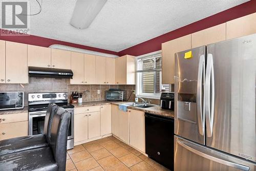 6556 Martingrove Drive Ne, Calgary, AB - Indoor Photo Showing Kitchen With Double Sink