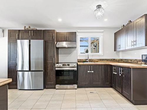 Kitchen - 42 Rue Hamelin, Lachute, QC - Indoor Photo Showing Kitchen With Double Sink