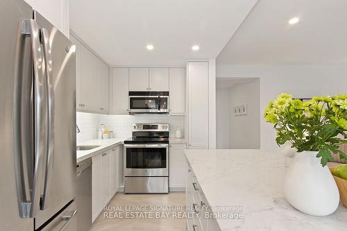 103-2 Ridelle Ave, Toronto, ON - Indoor Photo Showing Kitchen With Stainless Steel Kitchen With Upgraded Kitchen