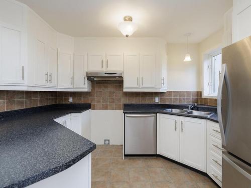 Cuisine - 65 Rue Des Brises, Saint-Clet, QC - Indoor Photo Showing Kitchen With Double Sink