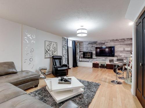 Family room - 465 Rue Parent, Mascouche, QC - Indoor Photo Showing Living Room With Fireplace