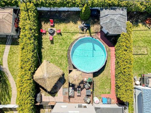 Aerial photo - 465 Rue Parent, Mascouche, QC - Outdoor With Above Ground Pool