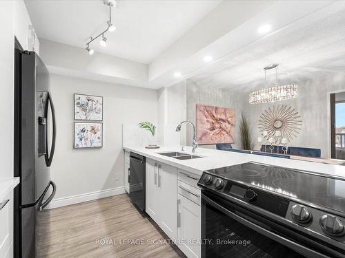 330-1880 Valley Farm Rd, Pickering, ON - Indoor Photo Showing Kitchen With Double Sink