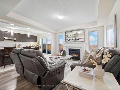 626 Laking Terr, Milton, ON - Indoor Photo Showing Living Room With Fireplace