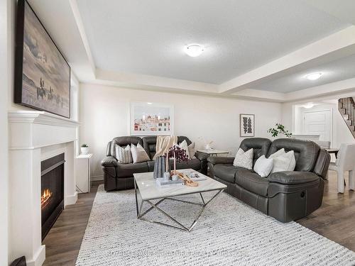 626 Laking Terr, Milton, ON - Indoor Photo Showing Living Room With Fireplace