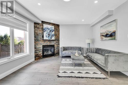 92 Pebblecreek Drive, Kitchener, ON - Indoor Photo Showing Living Room With Fireplace