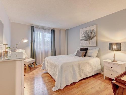 Chambre Ã  coucher principale - 104-1550 Av. Panama, Brossard, QC - Indoor Photo Showing Bedroom