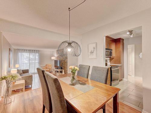 Salle Ã  manger - 104-1550 Av. Panama, Brossard, QC - Indoor Photo Showing Dining Room