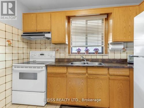 79 Cuffley Crescent S, Toronto, ON - Indoor Photo Showing Kitchen With Double Sink