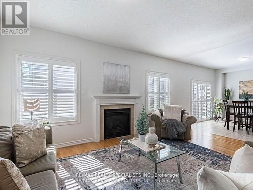 80 Thornbush Boulevard, Brampton, ON - Indoor Photo Showing Living Room With Fireplace