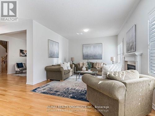 80 Thornbush Boulevard, Brampton, ON - Indoor Photo Showing Living Room With Fireplace