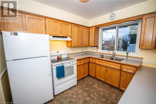 180 Miller Street, Mount Forest, ON - Indoor Photo Showing Kitchen With Double Sink