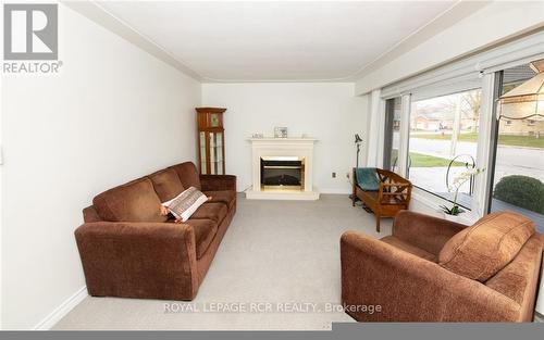 180 Miller Street, Wellington North (Mount Forest), ON - Indoor Photo Showing Living Room With Fireplace