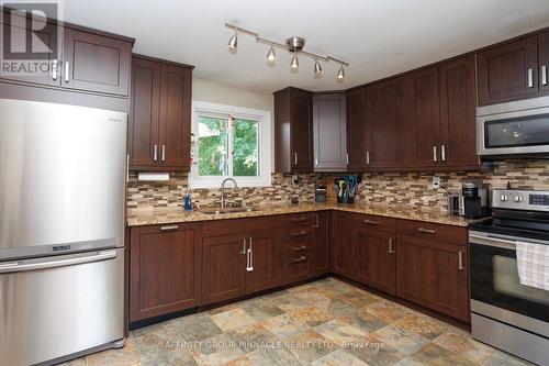 671 Balsam Lake Drive, Kawartha Lakes (Kirkfield), ON - Indoor Photo Showing Kitchen With Double Sink