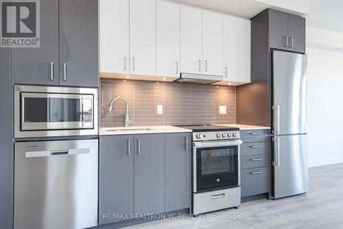 2411 - 50 Upper Mall Way, Vaughan, ON - Indoor Photo Showing Kitchen With Upgraded Kitchen