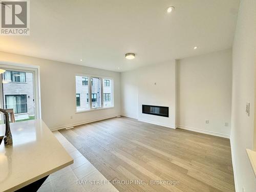 3031 Bramall Gardens, Oakville, ON - Indoor Photo Showing Living Room With Fireplace