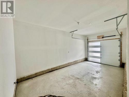 3031 Bramall Gardens, Oakville, ON - Indoor Photo Showing Garage