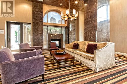 1911 - 385 Prince Of Wales Drive, Mississauga, ON - Indoor Photo Showing Living Room With Fireplace