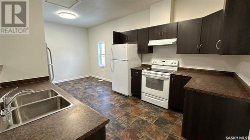 1711 Montreal Street, Regina, SK - Indoor Photo Showing Kitchen With Double Sink