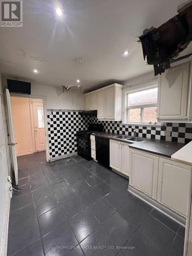 1040 Kennedy Road, Toronto, ON - Indoor Photo Showing Kitchen With Double Sink