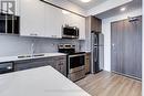 2306 - 49 Walnut Street S, Hamilton, ON  - Indoor Photo Showing Kitchen With Stainless Steel Kitchen With Double Sink With Upgraded Kitchen 