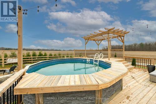 1424 Concession 6 Woodhouse, Norfolk, ON - Outdoor With Above Ground Pool With Deck Patio Veranda With View