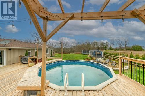 1424 Concession 6 Woodhouse, Norfolk, ON - Outdoor With Above Ground Pool With Deck Patio Veranda