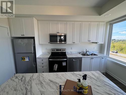 1403 - 160 Densmore Road, Cobourg, ON - Indoor Photo Showing Kitchen With Double Sink