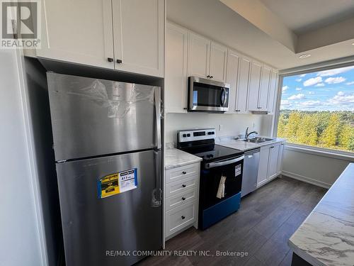 1403 - 160 Densmore Road, Cobourg, ON - Indoor Photo Showing Kitchen With Stainless Steel Kitchen