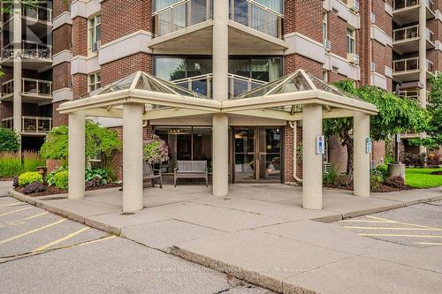 207 - 8 Christopher Court, Guelph, ON - Outdoor With Balcony With Facade