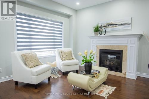 1 Colonial Drive, Guelph, ON - Indoor Photo Showing Living Room With Fireplace