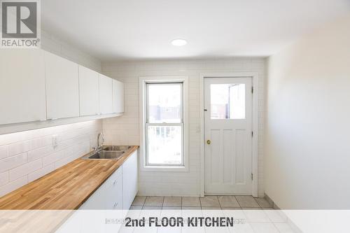 2 - 16 Madison Avenue, Hamilton, ON - Indoor Photo Showing Kitchen With Double Sink