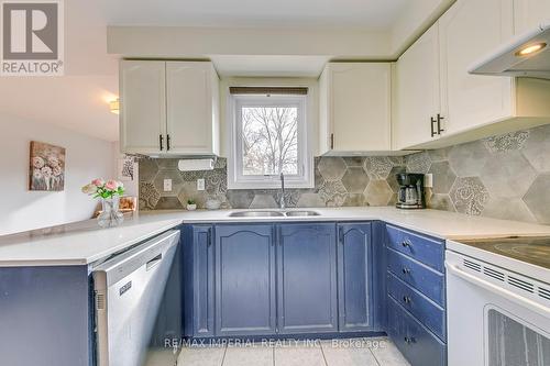 360 Riverstone Drive, Oakville, ON - Indoor Photo Showing Kitchen With Double Sink