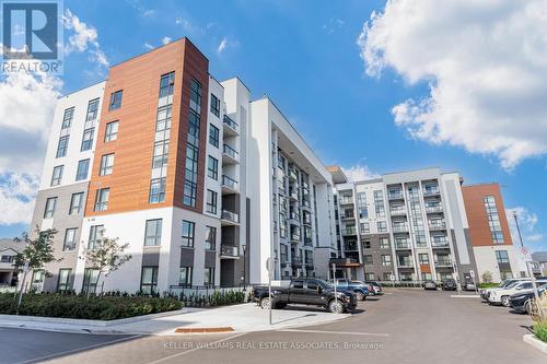 609 - 460 Gordon Krantz Avenue, Milton, ON - Outdoor With Balcony With Facade