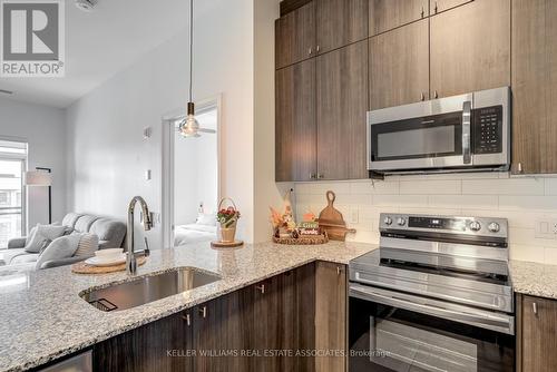 609 - 460 Gordon Krantz Avenue, Milton, ON - Indoor Photo Showing Kitchen With Upgraded Kitchen