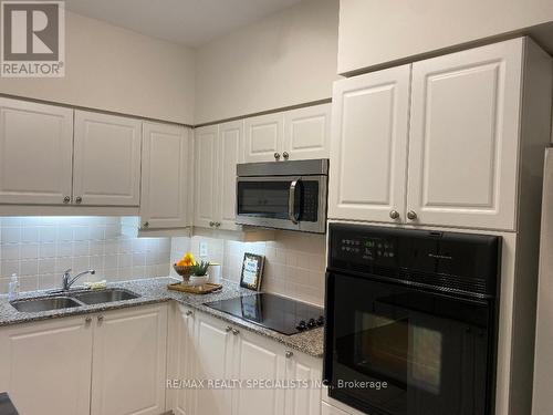 215 - 830 Scollard Court, Mississauga, ON - Indoor Photo Showing Kitchen With Double Sink