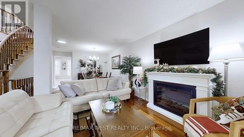 10 Via Cassia Drive, Toronto, ON - Indoor Photo Showing Living Room With Fireplace