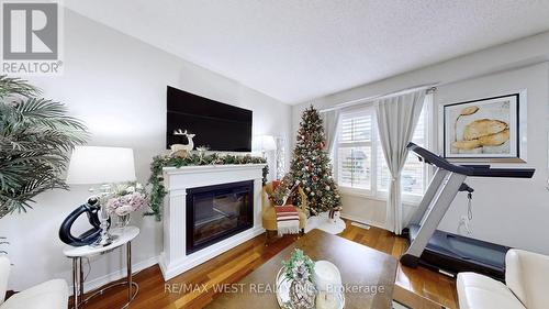 10 Via Cassia Drive, Toronto, ON - Indoor Photo Showing Living Room With Fireplace