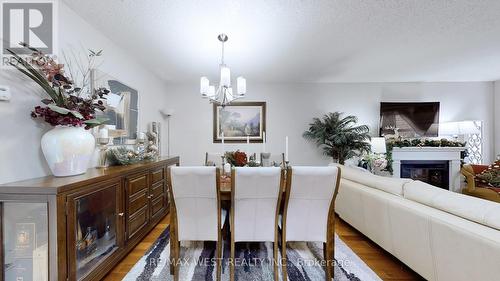 10 Via Cassia Drive, Toronto, ON - Indoor Photo Showing Living Room With Fireplace